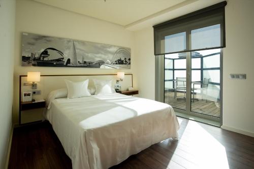 Habitación Doble Superior con terraza - 1 o 2 camas del hotel Primus Valencia. Foto 7