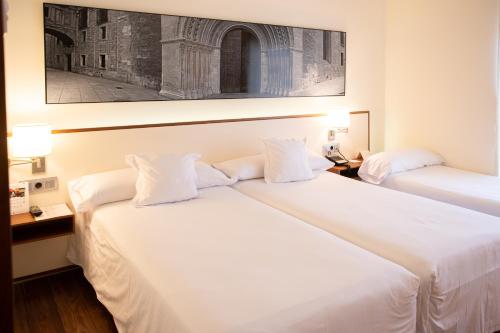 Habitación Triple del hotel Primus Valencia. Foto 1