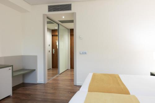 Habitación Triple del hotel Primus Valencia. Foto 5