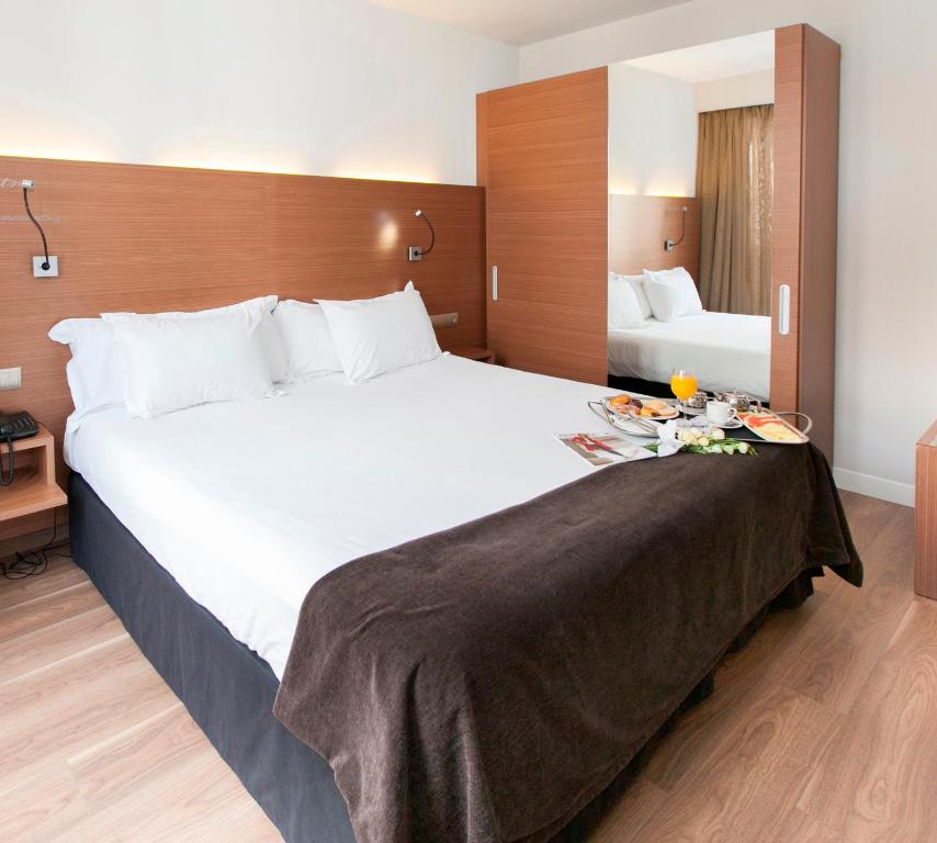 Habitación doble Económica del hotel Vincci Zentro Zaragoza. Foto 2