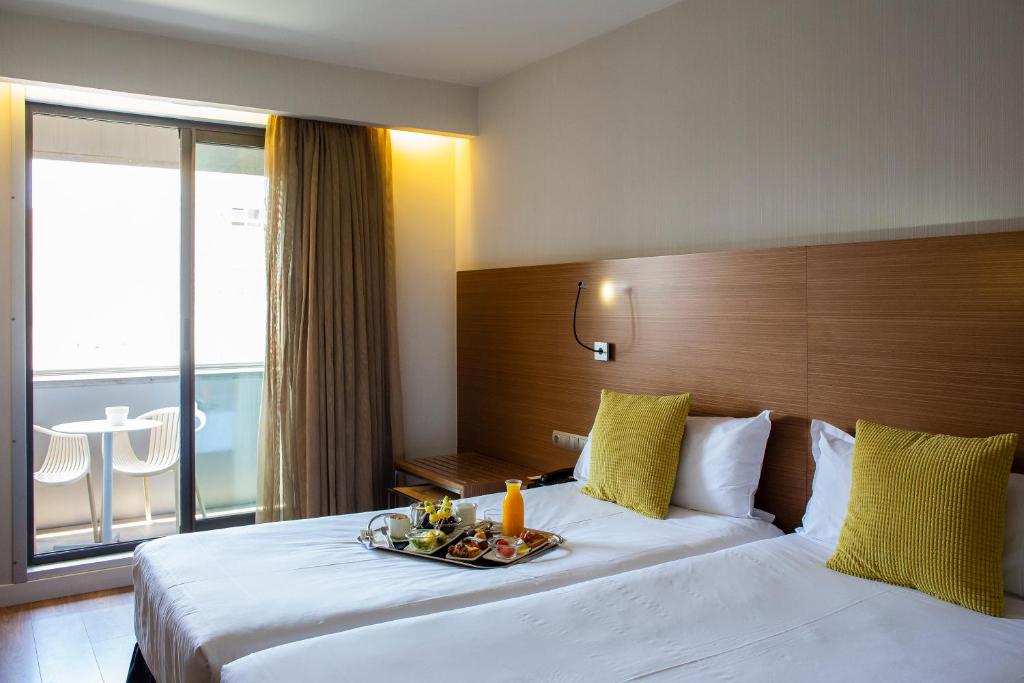 Habitación doble Balcón o Terraza del hotel Vincci Zentro Zaragoza. Foto 6