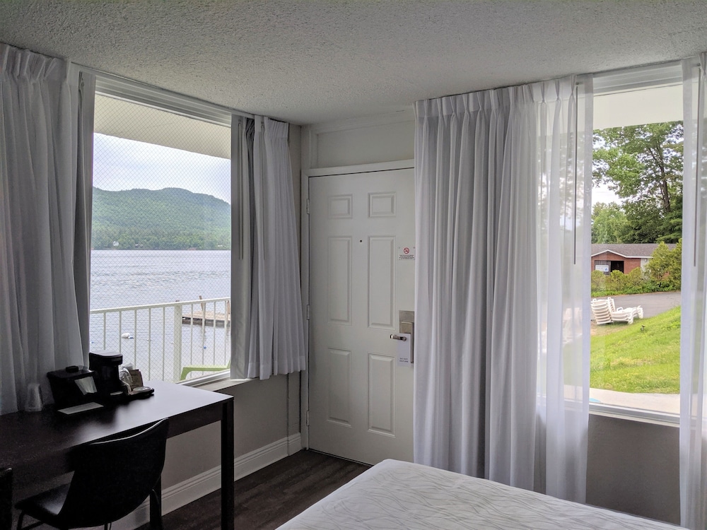 Habitación, 2 camas de matrimonio, vistas al lago, frente a la playa del hotel Lakefront Terrace Resort. Foto 3