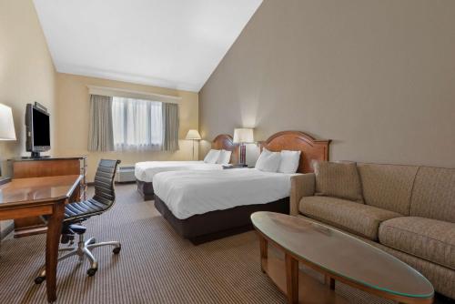 Habitación con 2 camas grandes del hotel Best Western University Inn. Foto 4