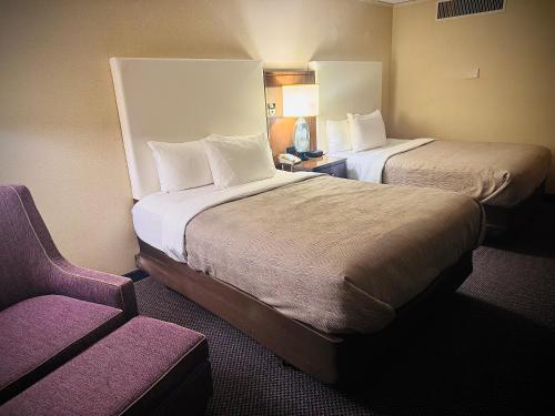 Habitación Doble con ducha accesible en silla de ruedas - 2 camas dobles - Adaptada para personas con movilidad reducida - No fumadores del hotel Quality Inn. Foto 1