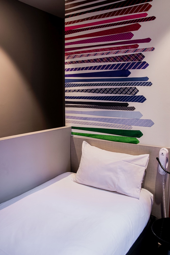 Habitación estándar con una cama individual del hotel Ibis Styles Lille Centre Grand Place. Foto 2
