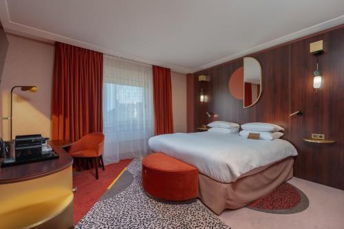 Habitación Doble Deluxe del hotel MGallery Nest Paris La Defense. Foto 6