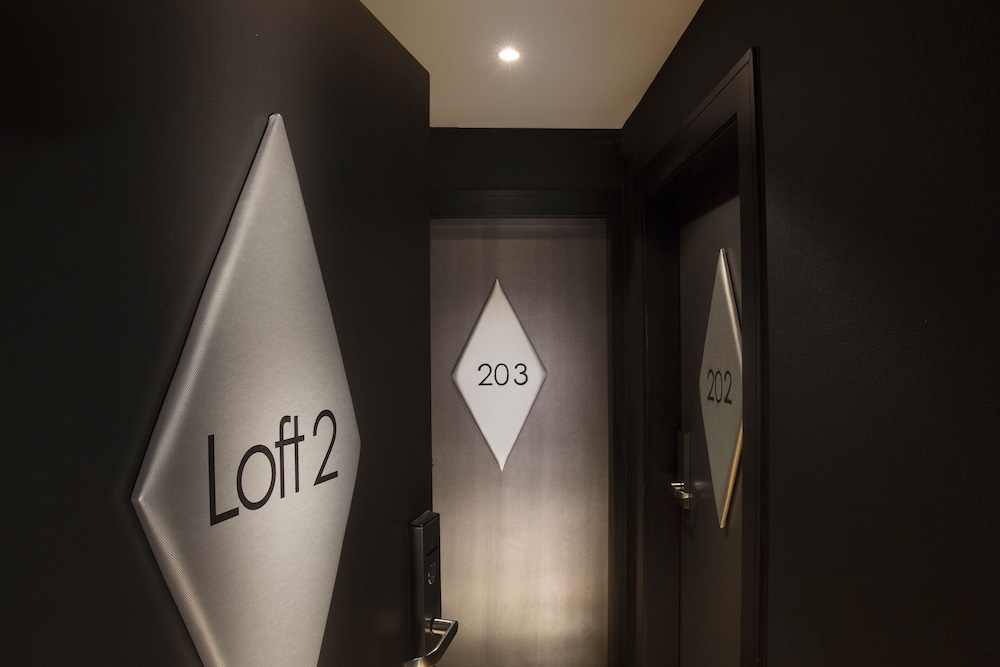 Dos habitaciones dobles comunicadas del hotel L'Empire Paris. Foto 1