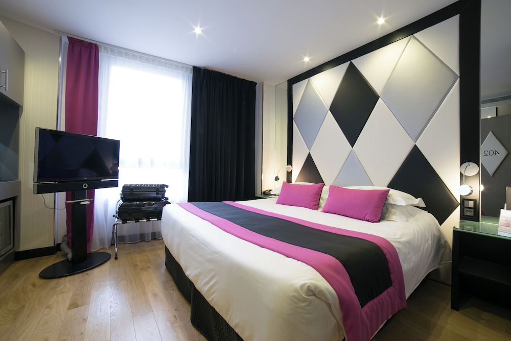 Dos habitaciones dobles comunicadas del hotel L'Empire Paris. Foto 3