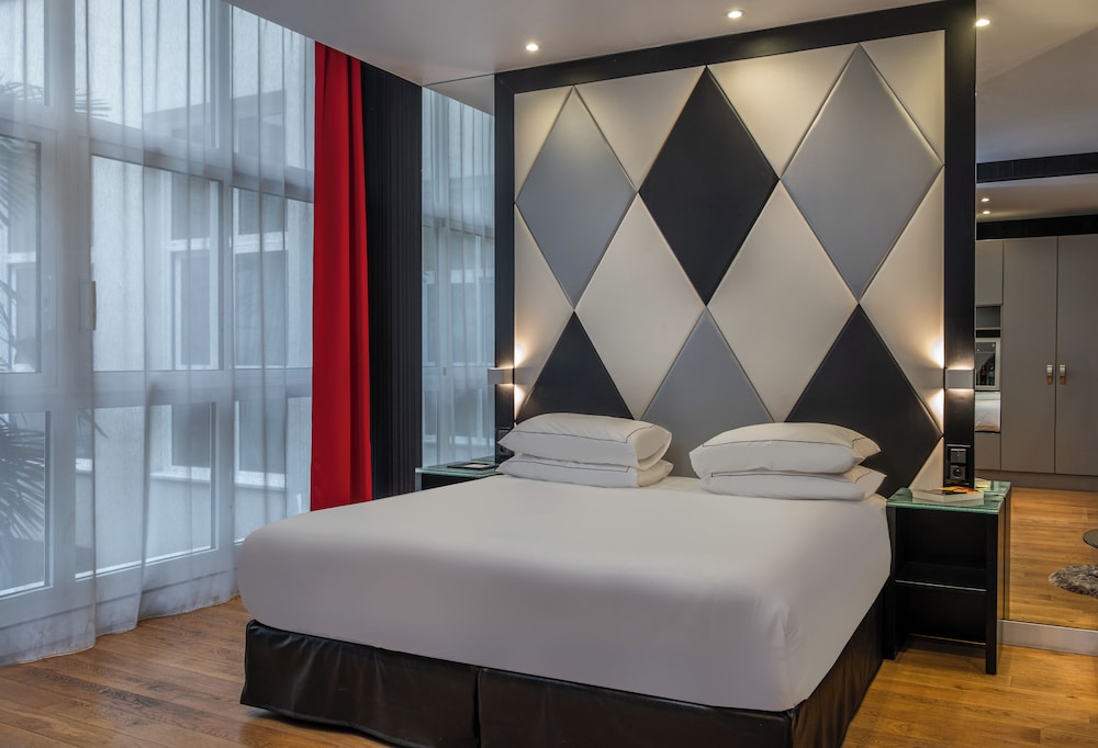 Habitación Deluxe doble del hotel L'Empire Paris. Foto 1