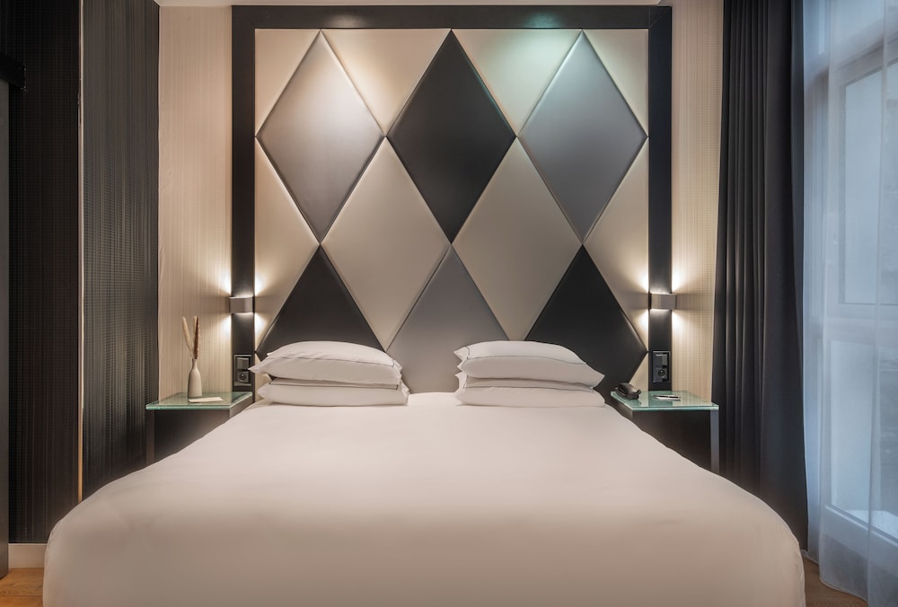 Habitación Deluxe doble del hotel L'Empire Paris. Foto 2