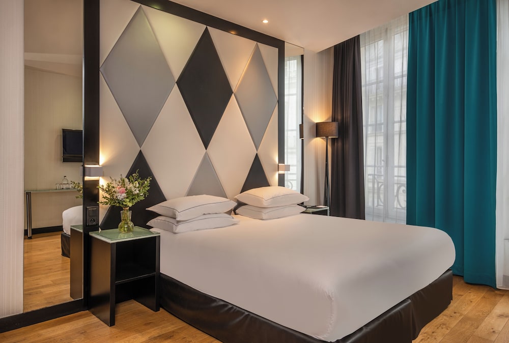 Habitación Deluxe doble del hotel L'Empire Paris. Foto 3