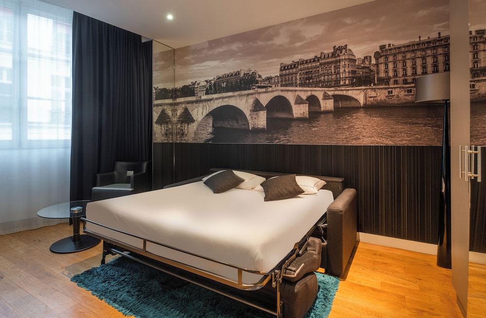 Suite ejecutiva, bañera de hidromasaje del hotel L'Empire Paris. Foto 6