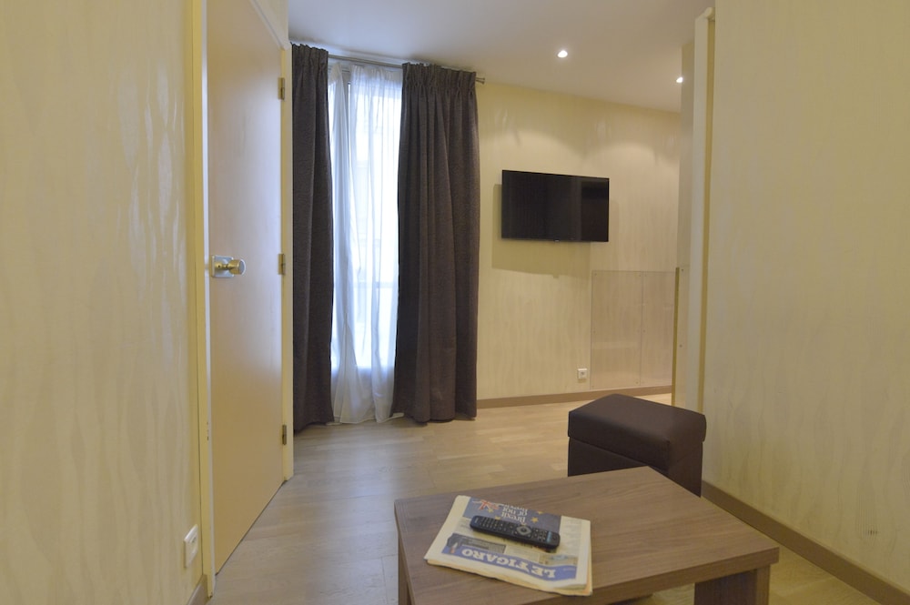 Suite familiar, 1 habitación del hotel Renoir. Foto 2
