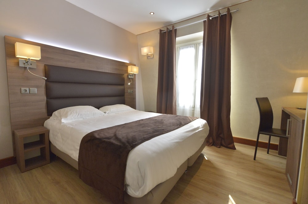 Habitación Individual del hotel Renoir. Foto 1