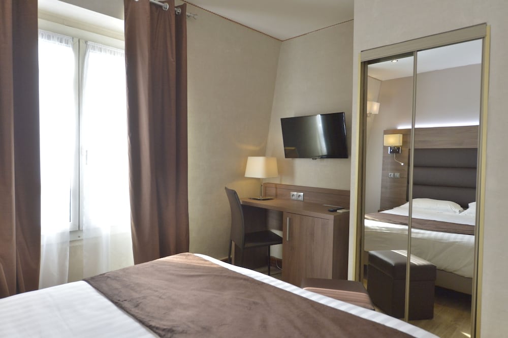 Habitación con 1 cama doble o 2 individuales del hotel Renoir. Foto 1