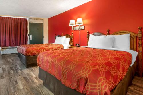 Habitación Doble con 2 camas dobles - No fumadores del hotel Econo Lodge Cortland. Foto 1