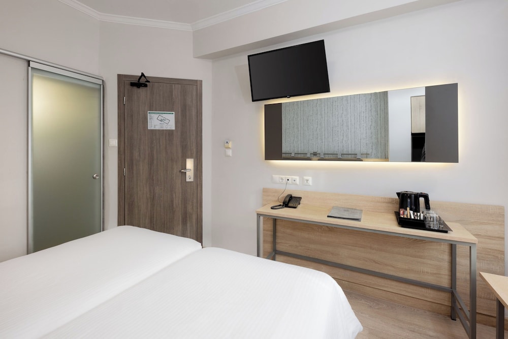 Habitación con 1 cama doble o 2 individuales del hotel Pan. Foto 10