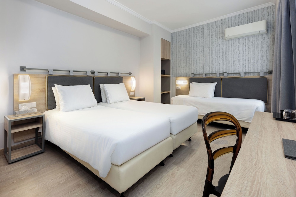 Habitación Triple del hotel Pan. Foto 3