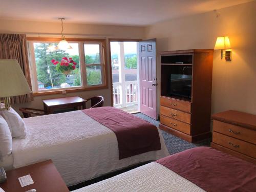 Habitación Doble con vistas al lago - 2 camas dobles del hotel Nordick's Inn
