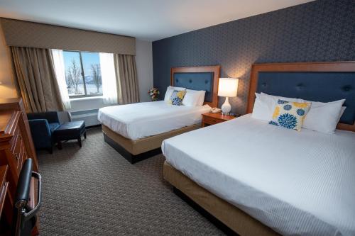 Premium Lake View with Two Queen Beds del hotel Fort William Henry and Conference Center. Foto 2