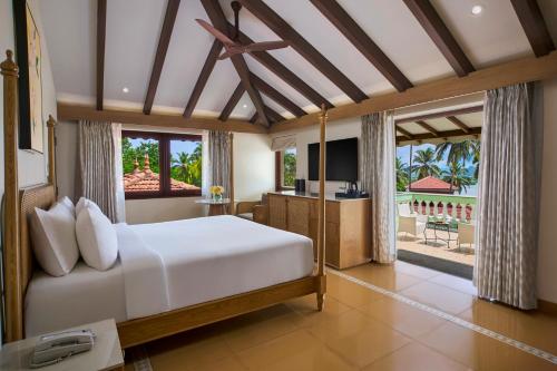 Junior Suite con 1 cama doble, lado jardín del hotel Mercure Goa Devaaya Resort