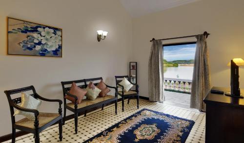 Junior Suite con 1 cama doble, lado jardín del hotel Mercure Goa Devaaya Resort. Foto 4