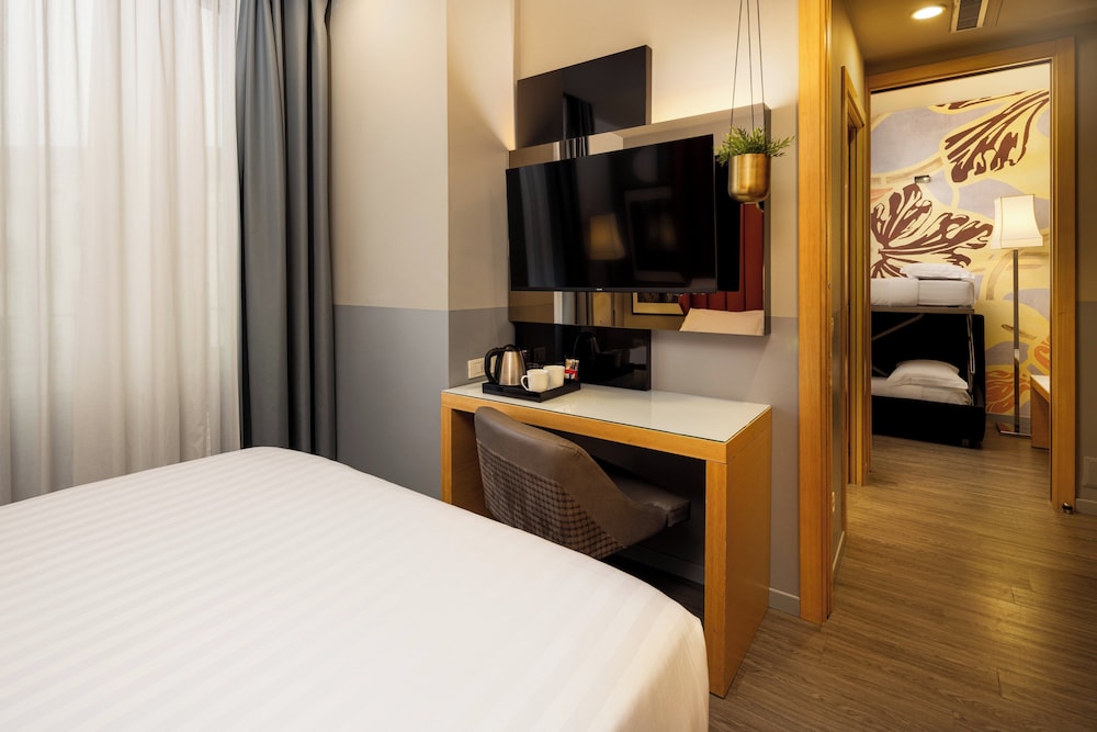 Habitación Premium, varias camas del hotel Holiday Inn Milan - Garibaldi Station, An Ihg. Foto 1