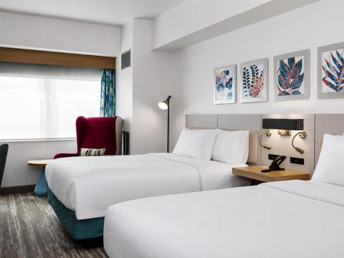 Habitación - 2 camas grandes - Adaptada para personas con discapacidad auditiva del hotel Hilton Garden Inn Ithaca. Foto 8