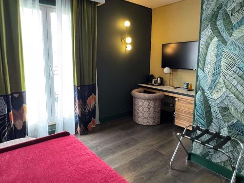Suite Junior con 2 plazas y terraza del hotel Mercure Roma Centro Saint John. Foto 1
