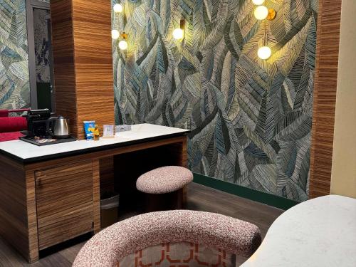 Suite Junior con 2 plazas y terraza del hotel Mercure Roma Centro Saint John. Foto 4