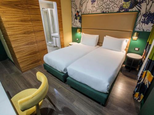 Habitación Doble Clásica (2 camas) del hotel Mercure Roma Centro Saint John. Foto 1