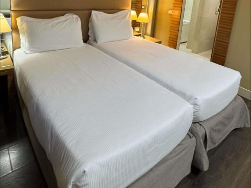 Habitación Doble Clásica (2 camas) del hotel Mercure Roma Centro Saint John. Foto 2