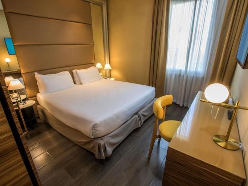 Habitación Doble Clásica del hotel Mercure Roma Centro Saint John. Foto 2