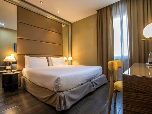 Habitación Doble Clásica del hotel Mercure Roma Centro Saint John. Foto 8