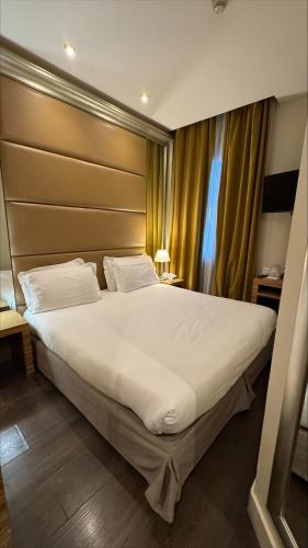 Habitación Individual Estándar del hotel Mercure Roma Centro Saint John. Foto 7