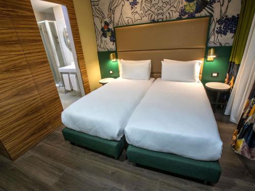 Habitación Doble Clásica (2 camas) del hotel Mercure Roma Centro Saint John. Foto 4