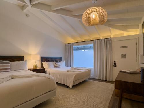 Habitación Doble Premier con 2 camas dobles del hotel The Montauk Beach House. Foto 9