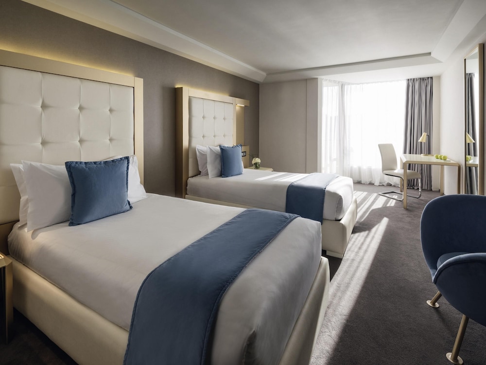 Habitación Premium con 2 camas individuales, 1 cama individual, vistas parciales al mar del hotel Mövenpick and Casino Malabata Tanger