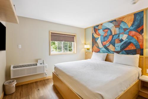 Estudio con cama extragrande del hotel Greenview Inn Riverhead. Foto 1