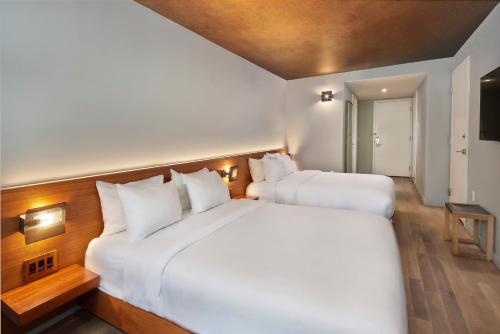 Habitación con cama grande del hotel El Truss Times Square