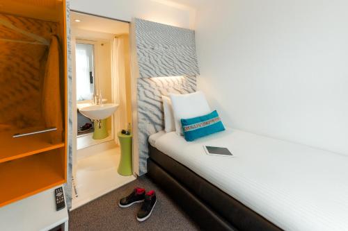 Habitación Individual Estándar del hotel Ibis Styles Amsterdam Central Station. Foto 4
