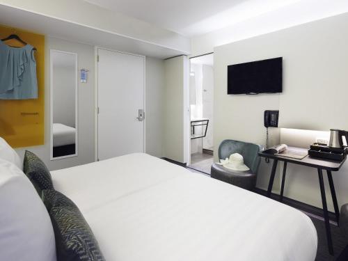 Habitación Doble Estándar - 2 camas del hotel Ibis Styles Amsterdam Central Station. Foto 3