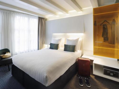 Habitación Doble Estándar del hotel Ibis Styles Amsterdam Central Station. Foto 1