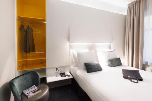 Habitación Doble Pequeña del hotel Ibis Styles Amsterdam Central Station. Foto 4