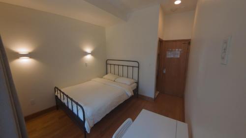 Habitación Doble con baño privado del hotel U.s. Pacific. Foto 3