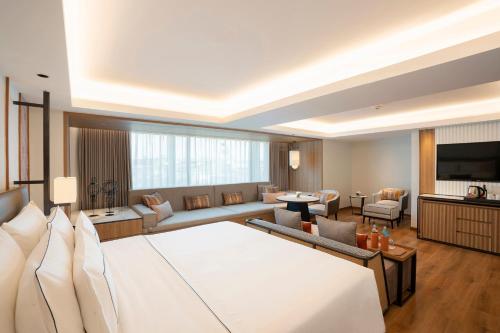 Habitación Esquinera Prémium The Level del hotel Melia Chiang Mai. Foto 1