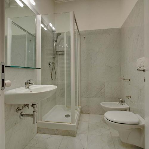 Apartamento Con Cocina 1 Cama queen 1 habitación Sofá Cama incluido del hotel Milan Apartment Rental. Foto 1