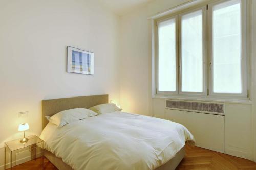 Apartamento Con Cocina 1 Cama queen 1 habitación Sofá Cama incluido del hotel Milan Apartment Rental. Foto 9