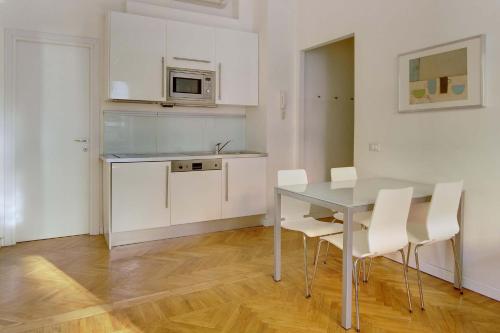 Apartamento Con Cocina 1 Cama queen 1 habitación Sofá Cama incluido del hotel Milan Apartment Rental. Foto 11