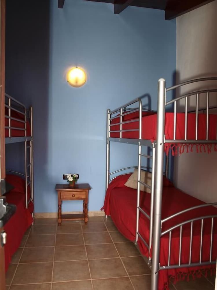 Habitación cuádruple, baño compartido del hotel Rural La Cañada